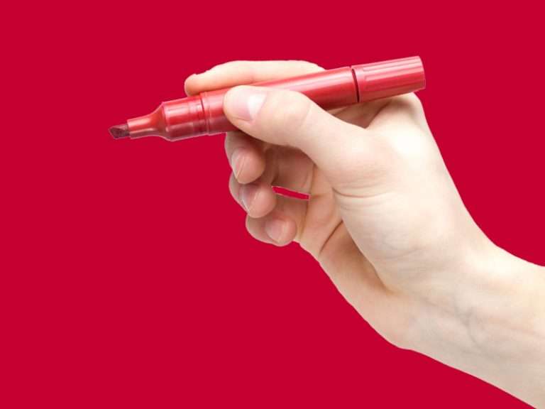 Rostift in einer Hand